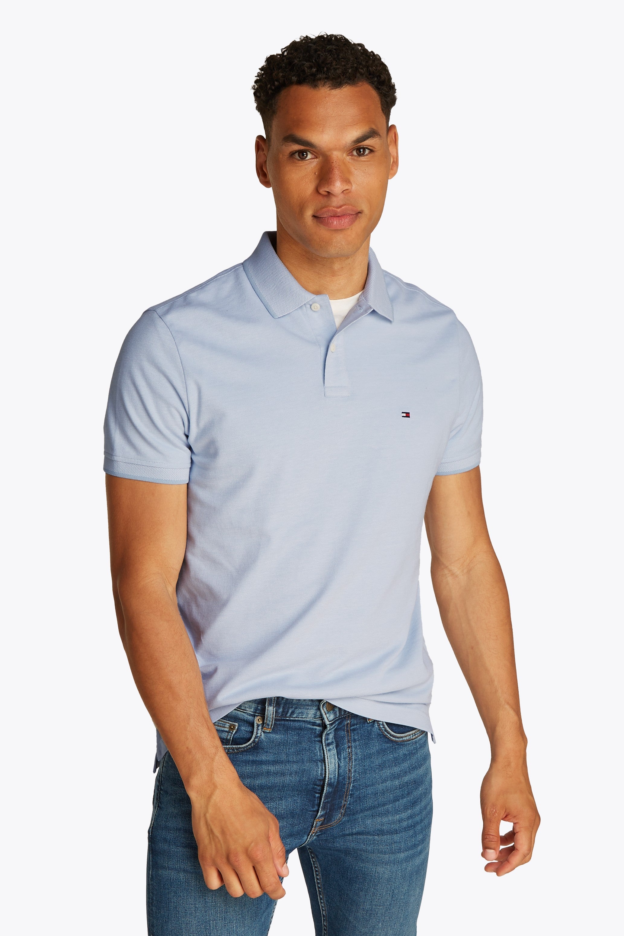 Tommy Hilfiger Two-Tone Polo Shirt – Model Wearing Classic Cotton Polo in Breezy Blue colour
